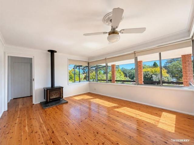 Spacious Four Bedroom Home with Large Sheds & Yard