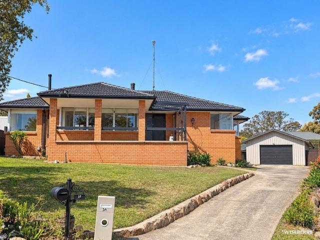 Spacious Four Bedroom Home with Large Sheds & Yard