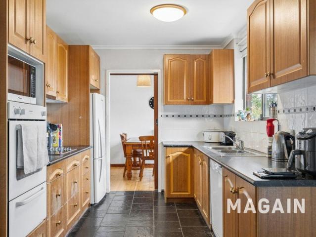 Spacious four bedroom home with potential to make your own!