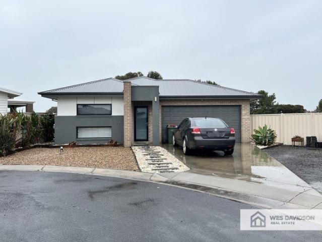 Spacious Four Bedroom Home with Secure Backyard