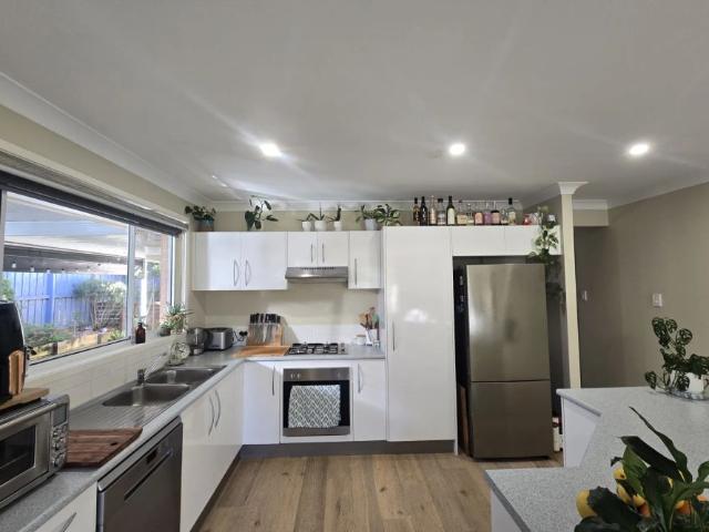 Spacious Four Bedroom Home with Solar, Double Garage & Gardens