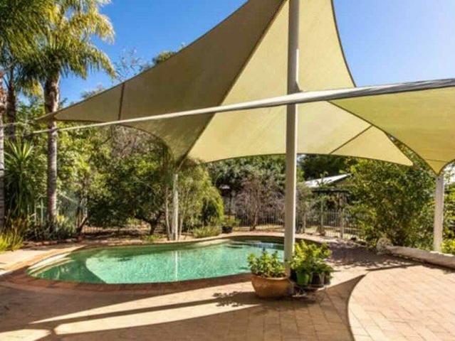 Spacious Four Bedroom Home with Solar, Pool, Gardens & Double Carport