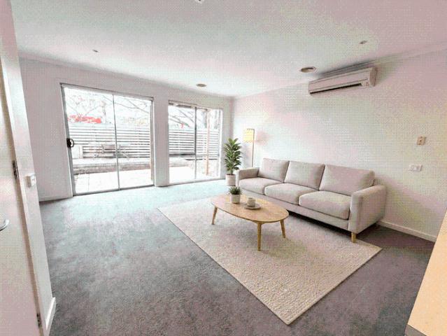 Spacious Four Bedroom Townhouse with Double Garage and Private Courtyard