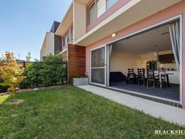 Spacious Four Bedroom Townhouse with Dual Master Suites and Lake Views