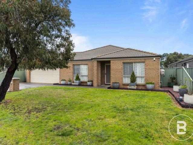 SPACIOUS FOUR BEDROOM, TWO LIVING WITH DRIVE THROUGH ACCESS