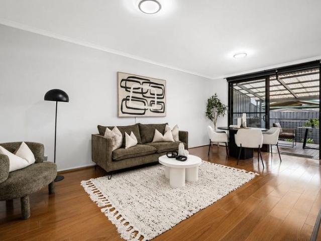 SPACIOUS, FRESHLY PAINTED, THREE BEDROOM TOWNHOUSE IN A PRIME LOCATION !