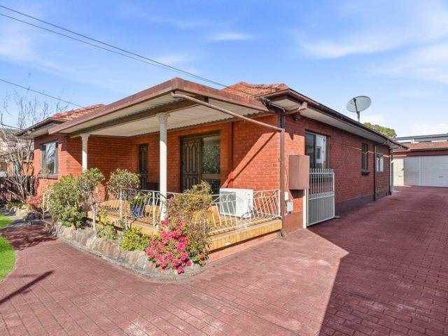 Spacious Full Brick Home with Development Potential