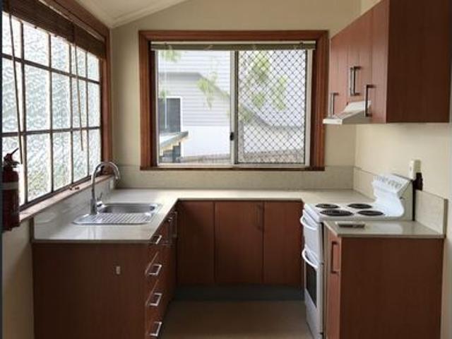 Spacious, Fully Fenced Courtyard + Storage!