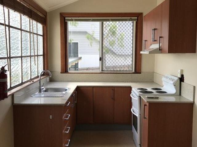 Spacious, Fully Fenced Courtyard + Storage!