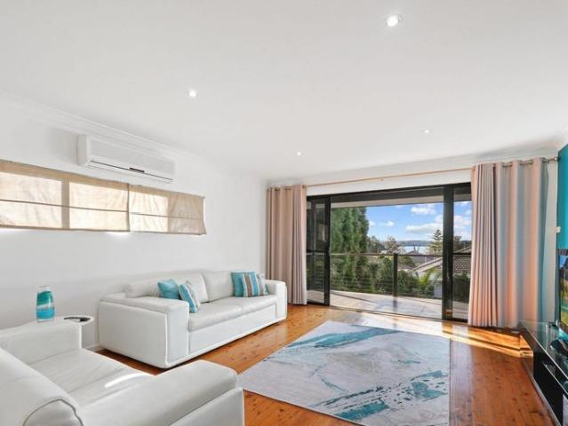 Spacious, Fully Furnished Lakeside Home with Stunning Views and Multiple Living Zones