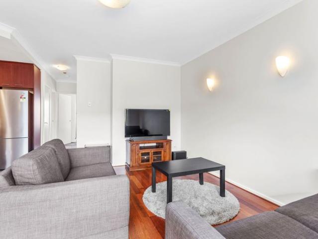 SPACIOUS FURNISHED APARTMENT WITH TWO CAR BAYS!