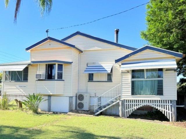 Spacious Furnished Queenslander Investment Opportunity on 1,106m² Corner Block