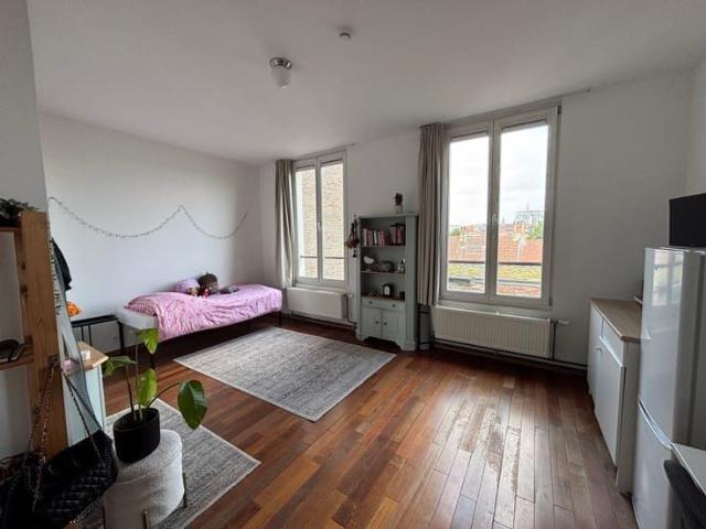 Spacious furnished room with private bathroom and kitchenett