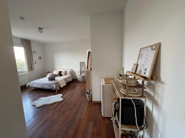 Spacious furnished room with private bathroom and kitchenett