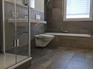 Spacious ground floor apartment with modern finishing standard in Herrenschwanden