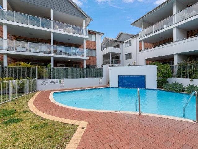 Spacious Ground Floor Apartment with Poolside Living