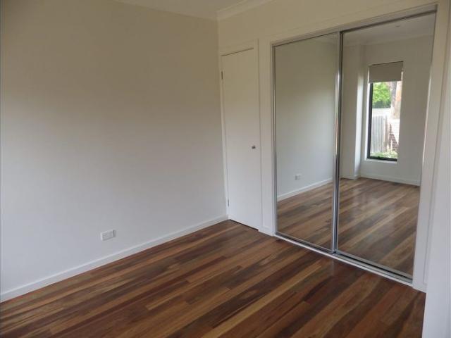 Spacious Ground Floor Apartment with Private Courtyard & Lock Up Garage