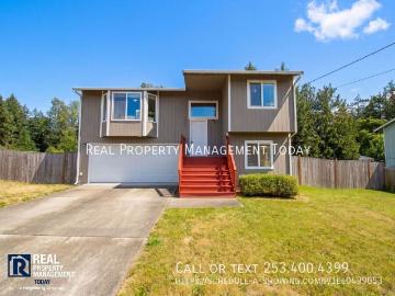 Spacious Graham Home with 2 Car Garage & Large Backyard