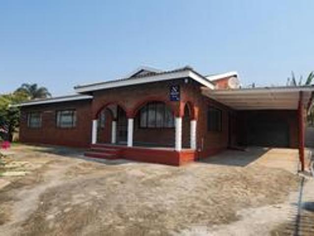 spacious home with 2 kitchens and lo.