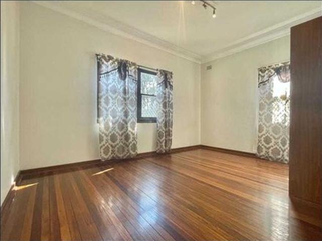 Spacious Home with Generous Backyard
