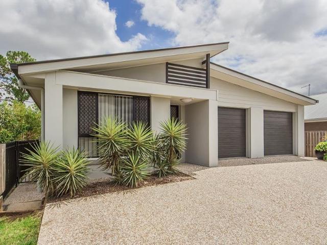 Spacious Home with Fully Fenced Back Yard