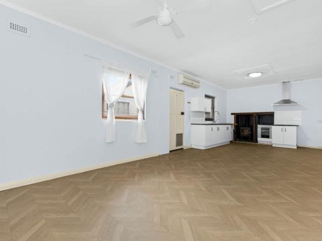 Spacious Home with Large Shed, Generous Yard & Convenient Location