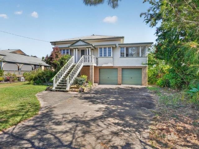 Spacious Home with Renovated Interiors & Exceptional Shed Space Must Be Sold!