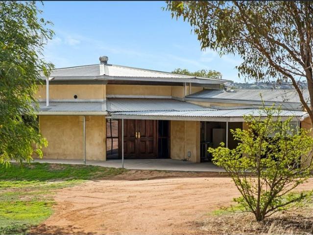 Spacious House on a Large Block with Sheds