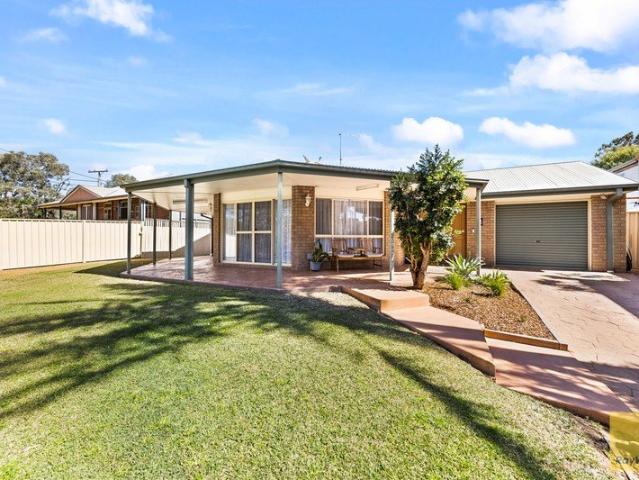 SPACIOUS IMMACULATE BRICK HOME