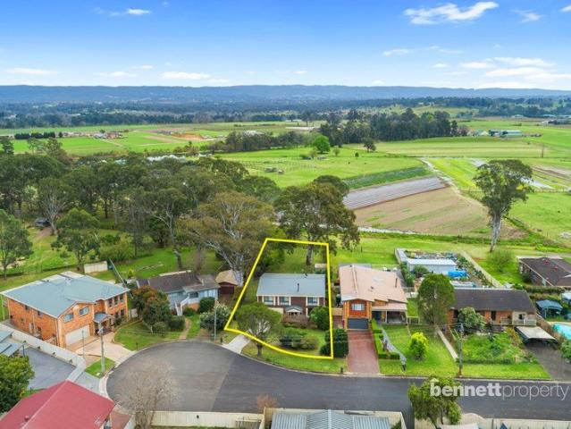 SPACIOUS LAYOUT WITH DUAL LIVING POTENTIAL, RURAL VIEWS AND HUGE YARD