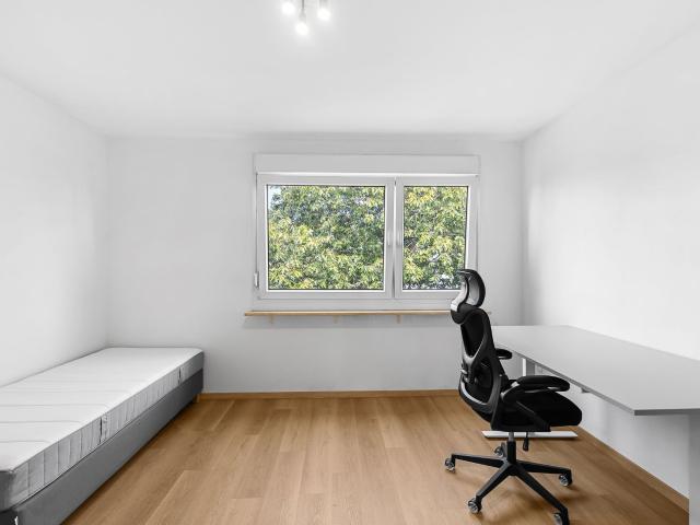 Spacious, light filled, and partially furnished apartment in a quiet location – ideal for families