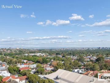 Spacious, Light Filled Apartment with Panoramic District Views in a Tranquil Elevated Setting!