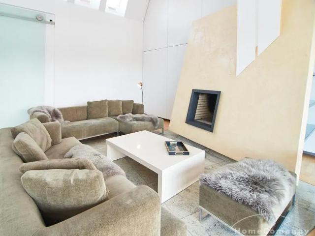 Spacious, light filled four bedroom apartment with fireplace and terrace near the Alster