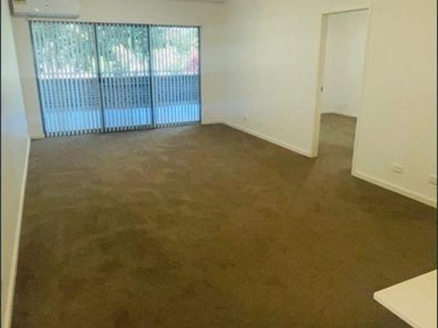 SPACIOUS, LIGHT FILLED LIVING IN A QUIET AND CONVENIENT LOCATION