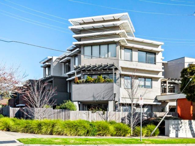 Spacious, Light Filled Living with East Facing Balcony