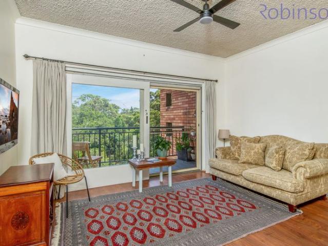 Spacious, light filled two bedroom unit at the end of a quiet cul de sac with city views