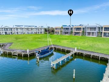 Spacious Lock & Leave Waterfront Living for Those Seeking Comfort Without Compromise
