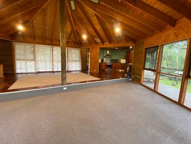 Spacious Log cabin style home with Large Deck Overlooking Hills Garden