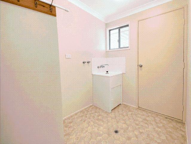 Spacious & Low Maintenance Family Home with Double Garage Shed