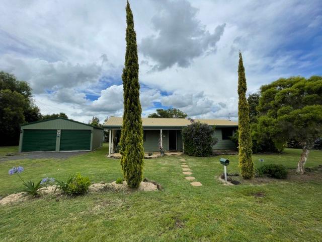 Spacious & Low Maintenance Family Home with Double Garage Shed