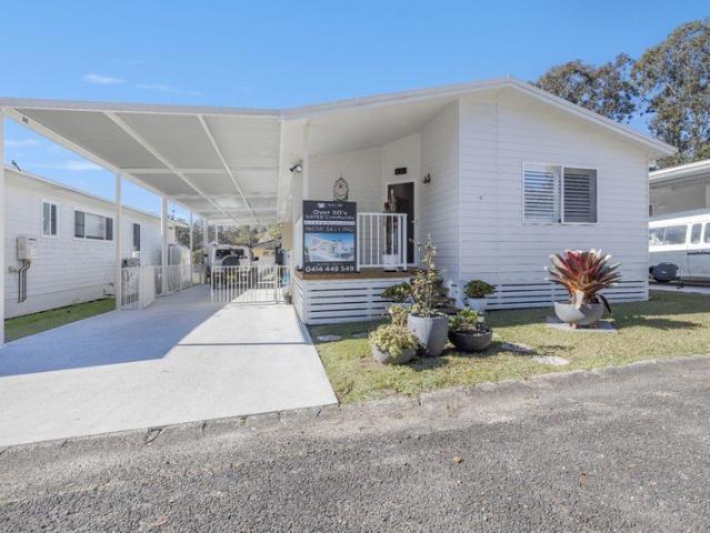 Spacious & Low Maintenance Living in a Peaceful Village Setting