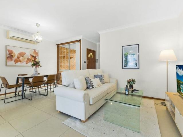 Spacious, Low Maintenance Villa Living in a Prime Central Location!