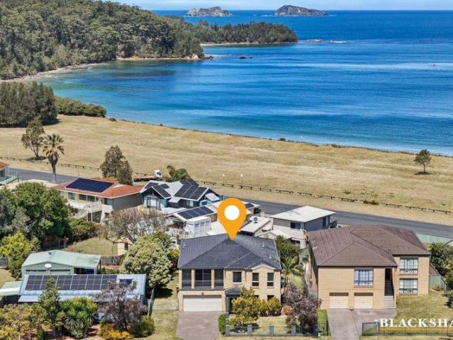 Spacious master built home with ocean views moments from Maloneys Beach