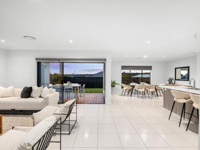 Spacious Metricon Home With Three Living Areas, Solar & Designer Upgrades!