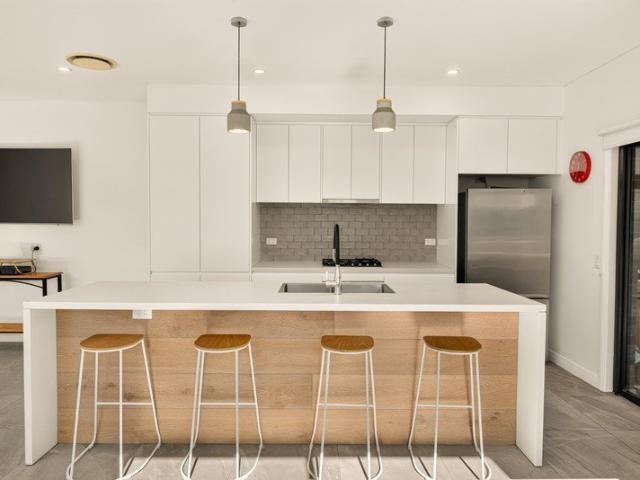 Spacious Modern Duplex Offering Exceptional Family Flexibility