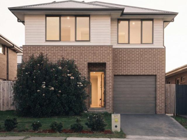 Spacious Modern Home with Stunning Views and Luxurious Features