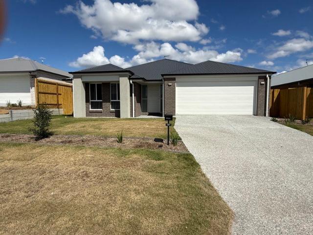 Spacious & Modern Home in Logan Reserve Multiple Living Areas