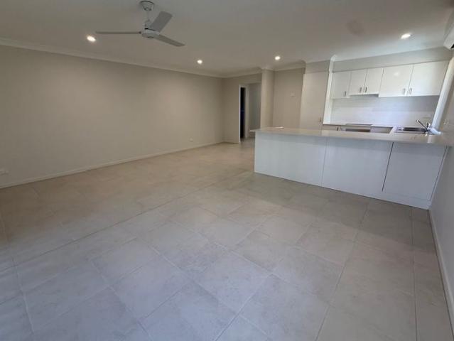 Spacious & Modern Home in Logan Reserve Multiple Living Areas