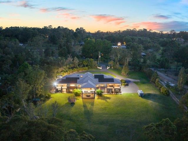 Spacious Multi Generational Acreage Living on 5.26 Acres in a Premier Duffys Forest Address