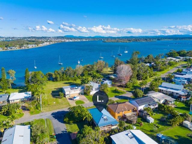 Spacious North Shore Classic with Riverfront Lifestyle Appeal